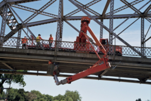 Bridge inspection Platform being used to carry out maintenance on bridge