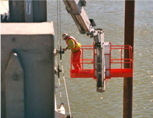 workman in a Boom Lift - skyjack 66Tk