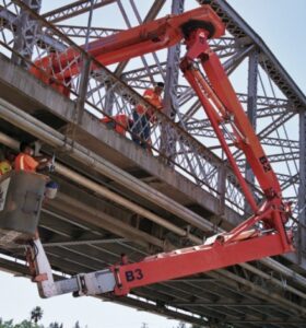 workmen inspection bridge using a boomlift