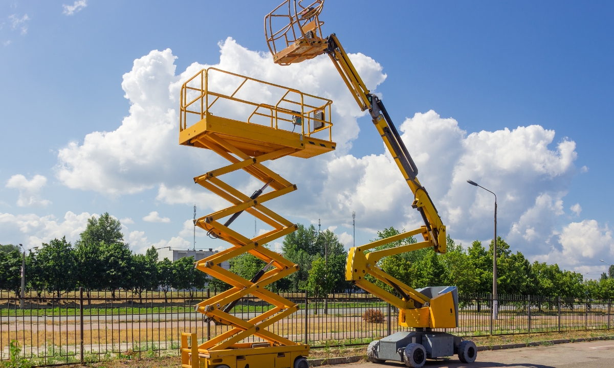 a yellow scissor lift